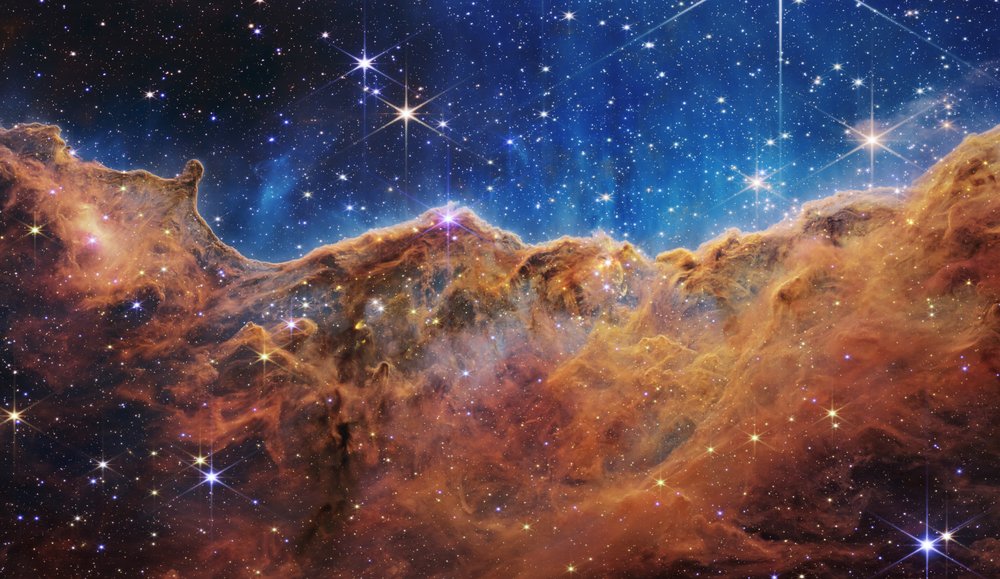カリーナ星雲の宇宙の崖 (NIRCam 画像)