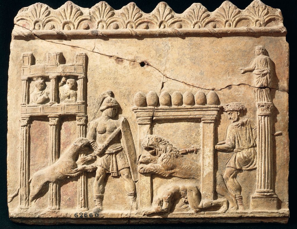 サーカスで戦うライオンと剣闘士を描いたローマ時代のレリーフ