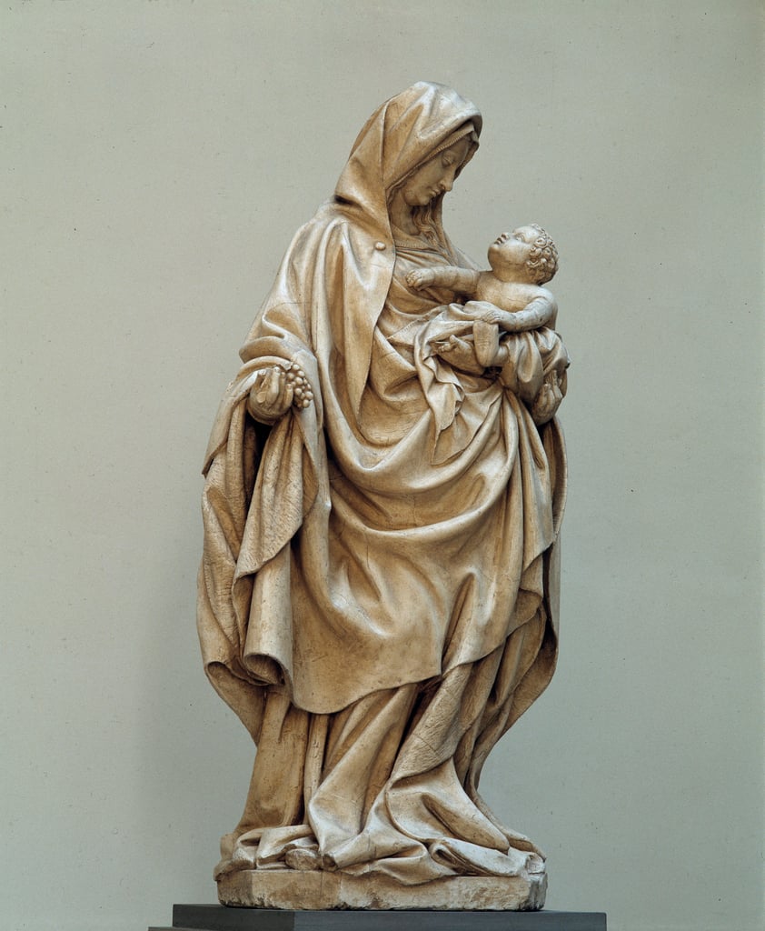 葡萄を抱く聖母像 クラウス・デ・ヴェルヴェ（13801439）の作とされる、クラウス・スルター派の作品。15世紀オーソンヌ（コート・ドール）の教会。