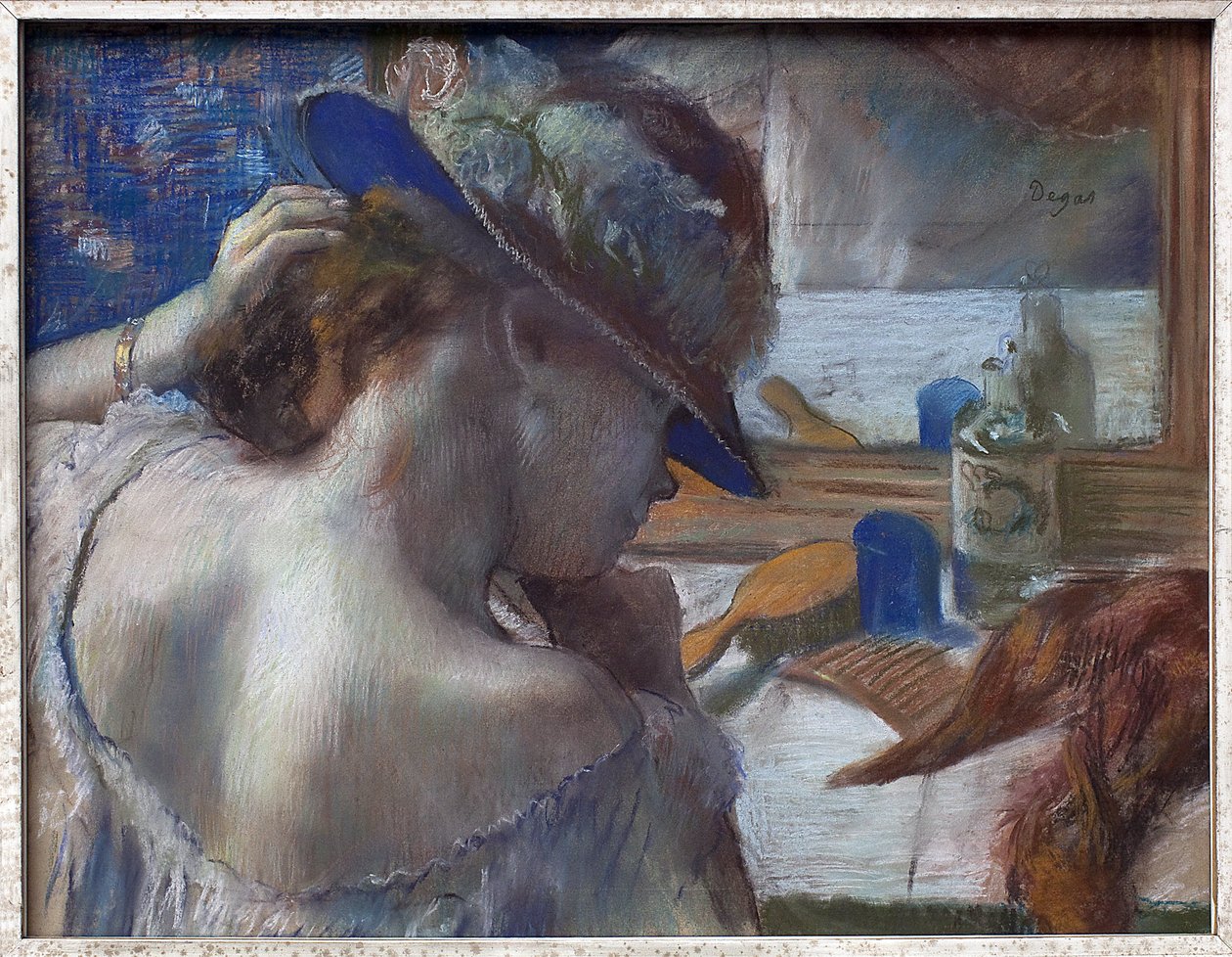 鏡の前で。エドガー・ドガ（1834-1917）の作品、1889年頃のパステル画。フランス美術 作： エドガー・ドガ