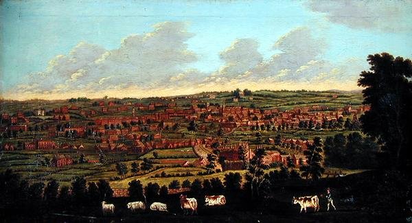 手前に牛や牧童を配した町の風景（パネルに寝かせたキャンバス 作： 英語学校