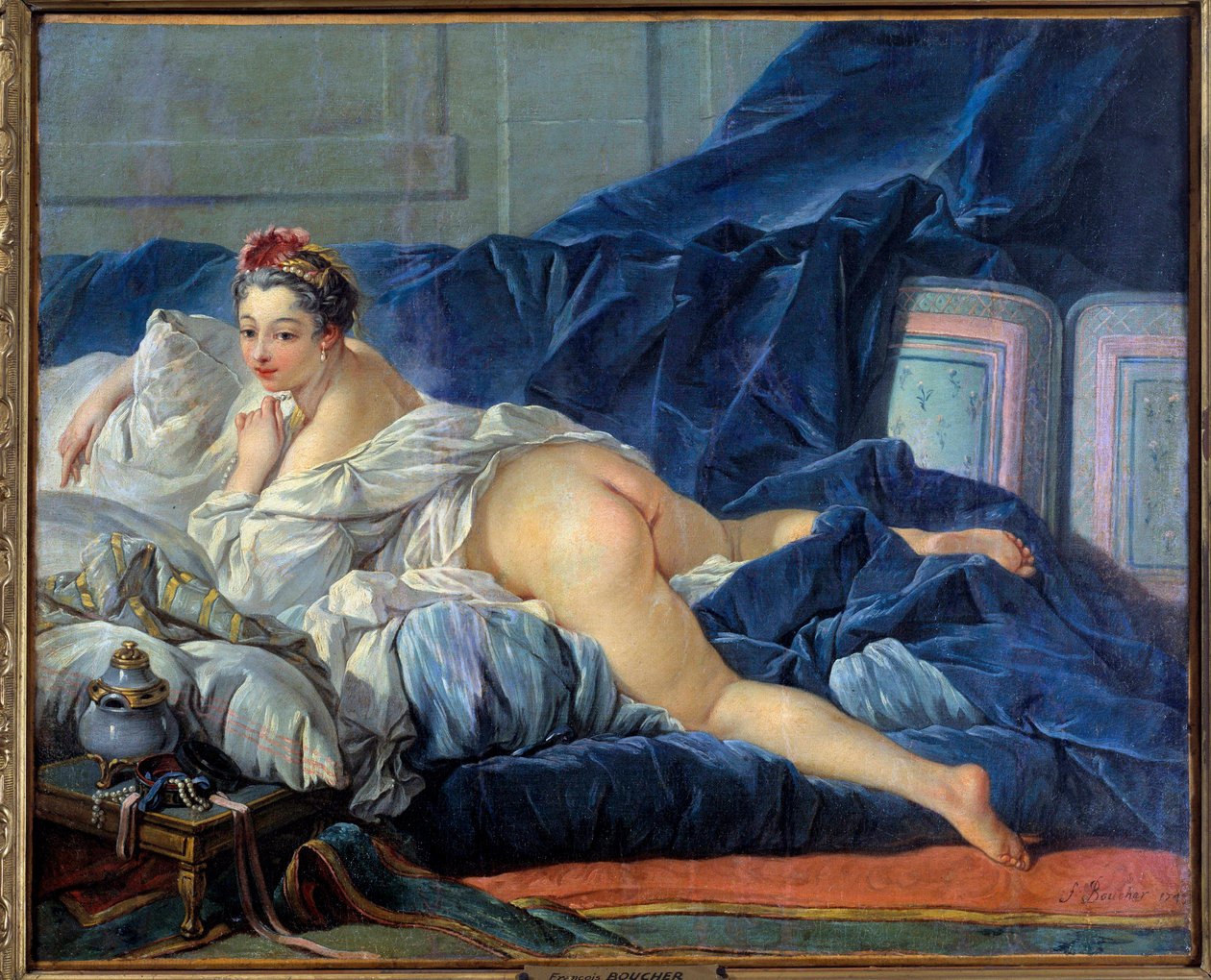 オダリスクの「若い女性」はソファに座っています。フランソワ・ブーシェ（1703-1770）による絵画 1752年 ランスの美術館 作： フランソワ・ブーシェ
