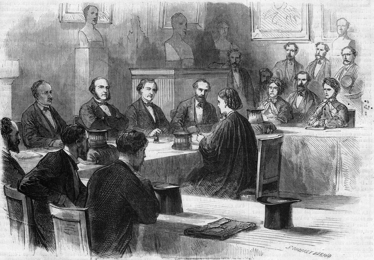 イギリス人のエリザベス・ギャレット・アンダーソン（1836-1917）は、1870年にパリの医学部の審査員の前でこれらを発表しました。彼女は初の女性医師となった。6月25日付「イラストレーション・ワールド」689号に掲載されたゴデフロイ・デュランのエングレーヴィング。 作： フランス語学校