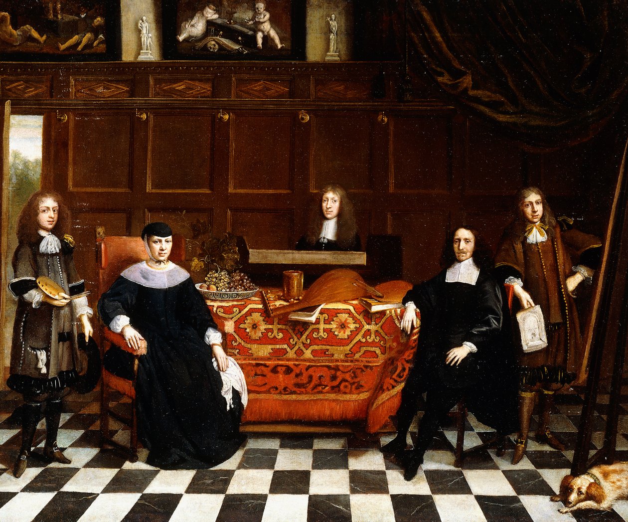 カーペットで覆われたテーブルの周りに座っている家族のグループの肖像、1665-70年 作： ギリス・ファン・ティルボル
