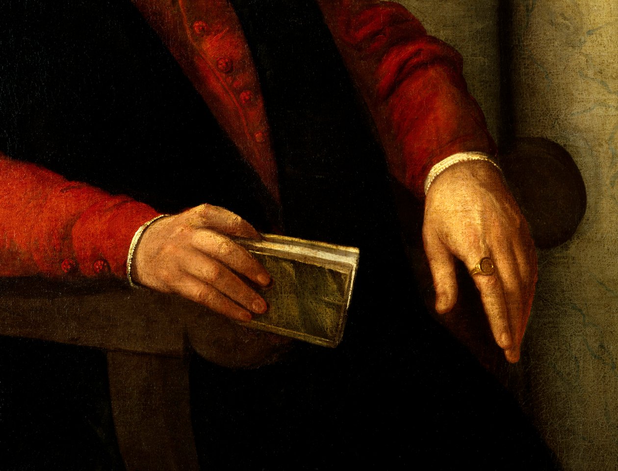 フランソワ・ラブレー（1494-1553）はフランスの作家・医師。手に持っている本と指にはめている騎士のディテール。ジョヴァンニ・バティスタ・モローニ（1525-1578）による絵画 作： ジョヴァンニ・バッティスタ・モロニ