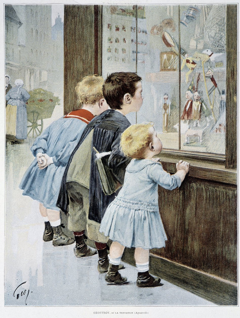ラ・テンプテーションショーケースの前でおもちゃを見る子供たち