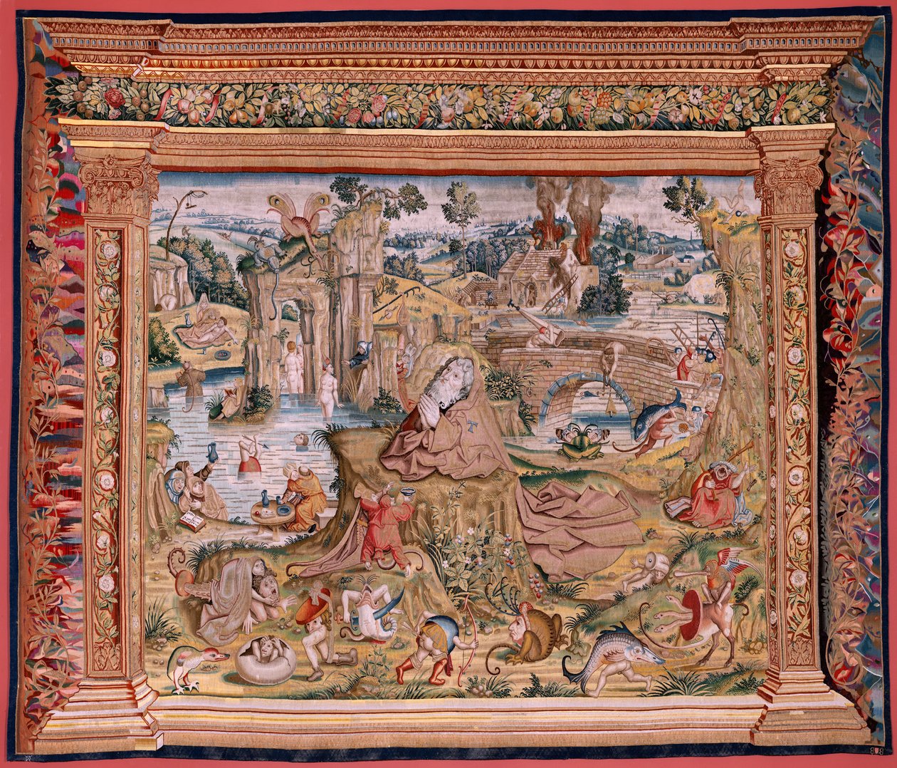 フランダースのタペストリー。 ヒエロニムス・ボスにちなんだシリーズ4のタペストリー。 祈りの聖アントニウス (San Antonio en oración)。 シリーズ第2弾のタペストリー。 ヒエロニムス・ボスの作品にインスパイアされたモデル。 マニュファクチュール アンノウン ワークショップ、ブリュッセル。 1560年以前。Fabric Go 作： ヒエロニムス（後）ボッシュ