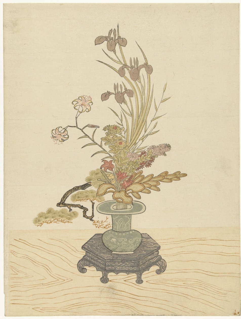 緑の花瓶の生け花アレンジ 作： 一筆斎文調（マナー）
