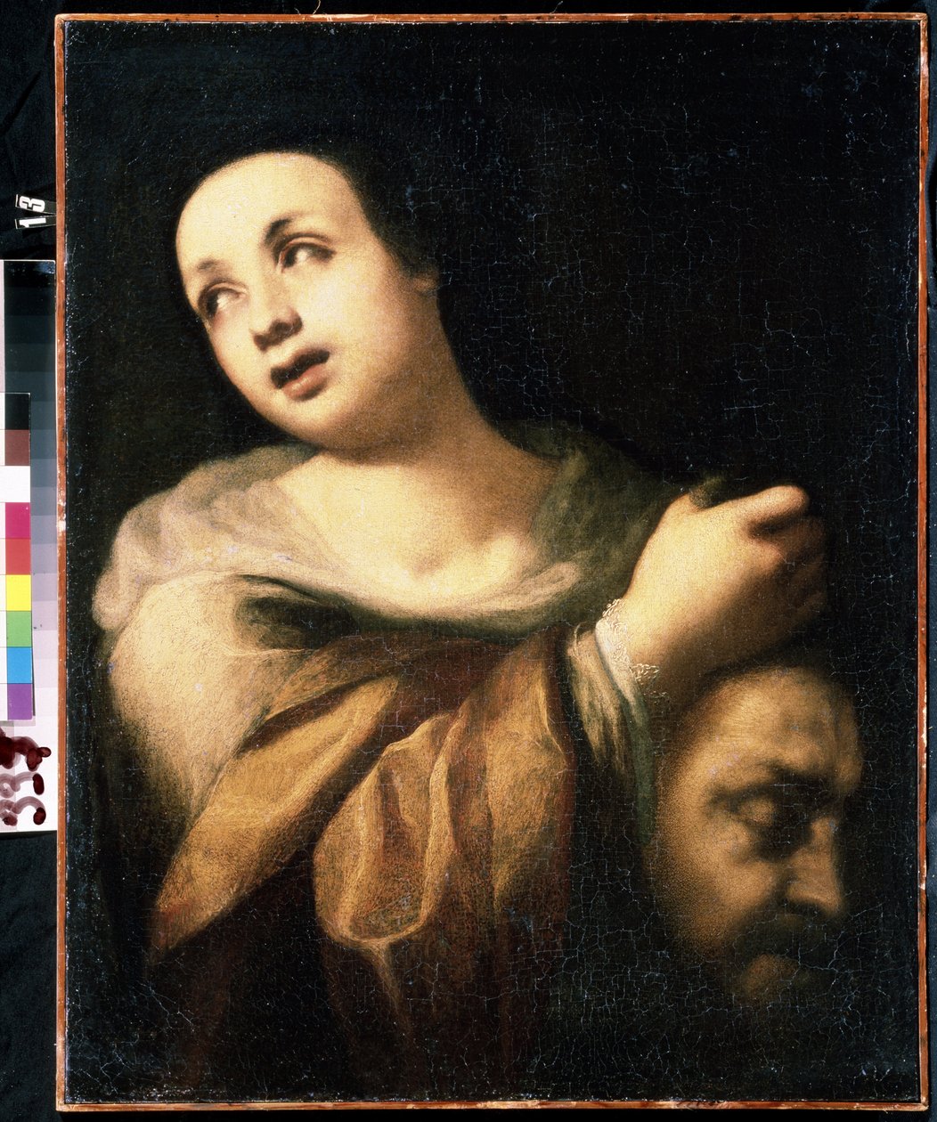 「ホロフェルネスの首を差し出すユディト」（ホロフェルネスの首を持つユディト） 17世紀のイタリア派の絵画ミハイル・クロシツキー美術館