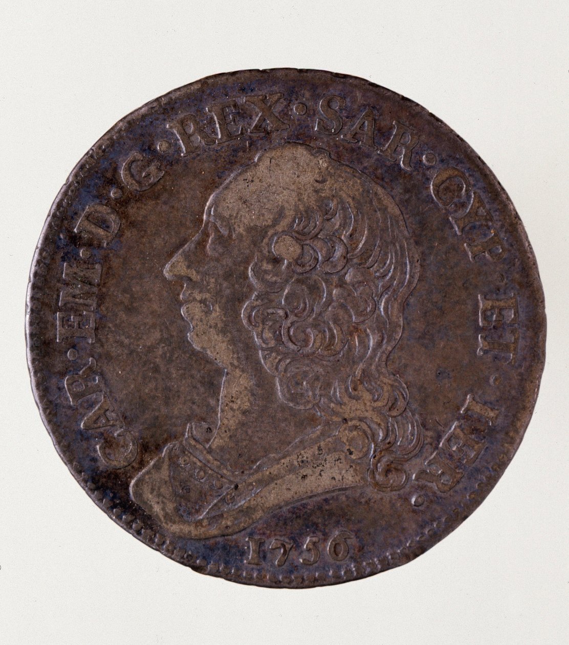 カルロ・エマヌエーレ3世・ディ・サヴォイア（1701年～1773年）（サルデーニャのチャールズ・エマヌエル3世）の時代に発行されたイタリアの銀貨（ハーフエキュ）。1756.直径3.7cm ナポリ、ムゼオ・アルケオロジコ 作： イタリア語学校