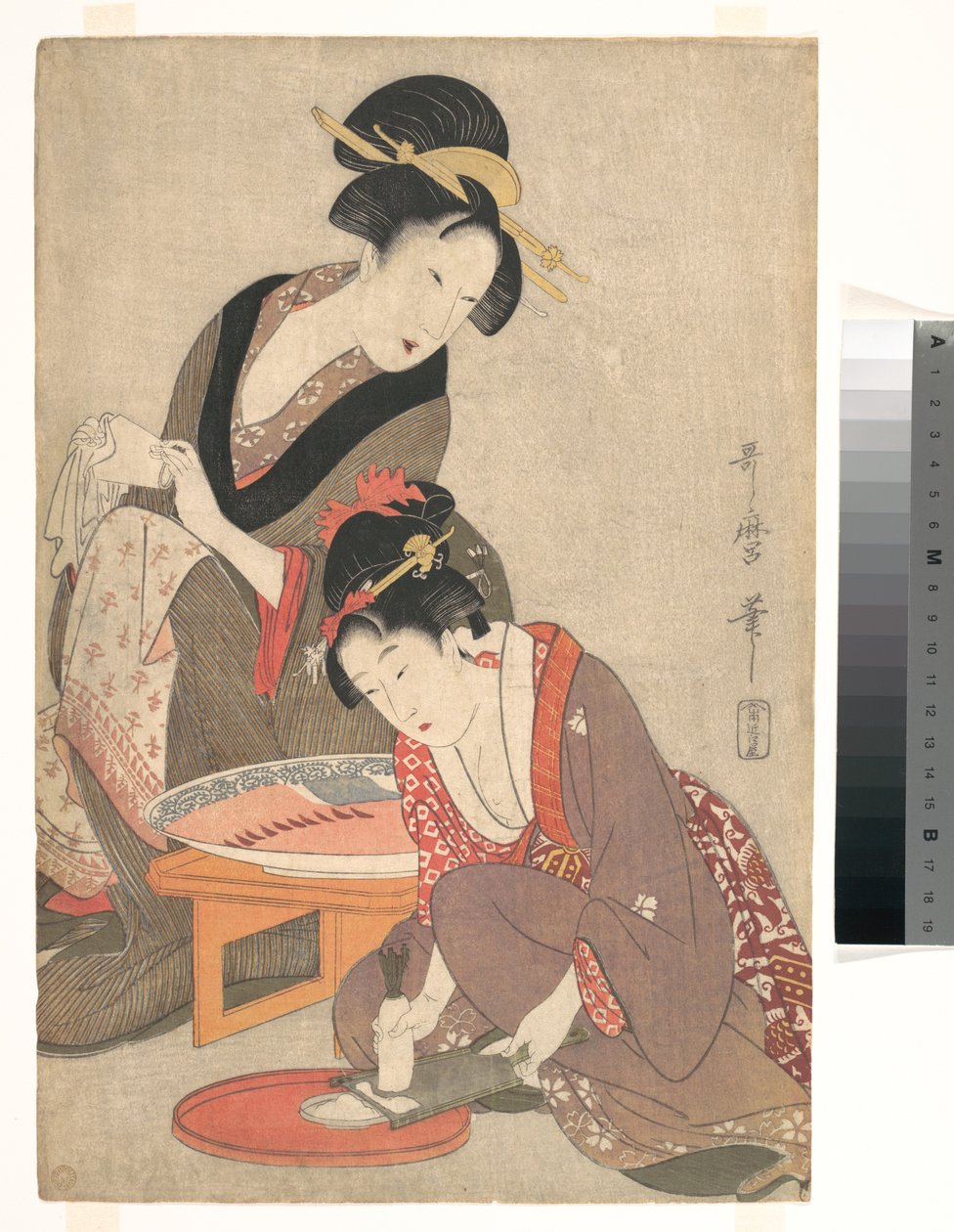 刺身を準備する女性たち 作： 北川歌ro