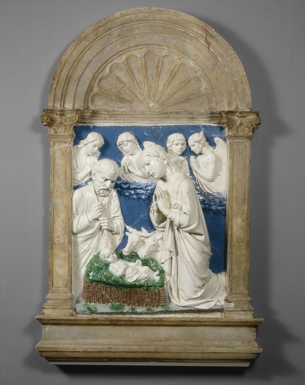 キリスト降誕、c.1460（釉薬テラコッタ） 作： ルカ・デラ・ロッビア