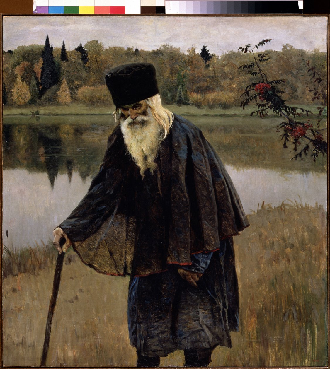 隠者（隠者）。 あごひげと白髪の老人が、杖をついて湖のほとりを歩いています。 Mikhail Vasilyevich Nesterov (1862-1942) の絵画、キャンバスに油彩 作： ミハイル・ヴァシリエヴィチ・ネステロフ