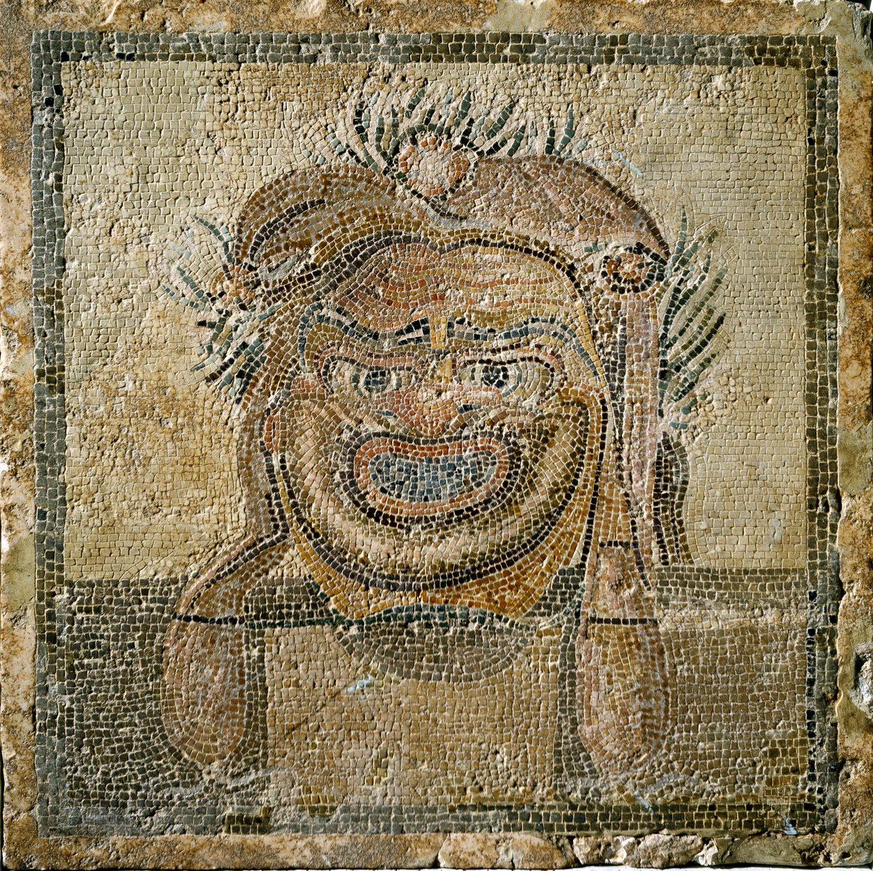 ローマのアート。ローマ劇場のマスク。アンピュリアス（Empurias）のモザイク。紀元2世紀スペイン アムプリアス美術館（Museo di Ampurias 作： 小説