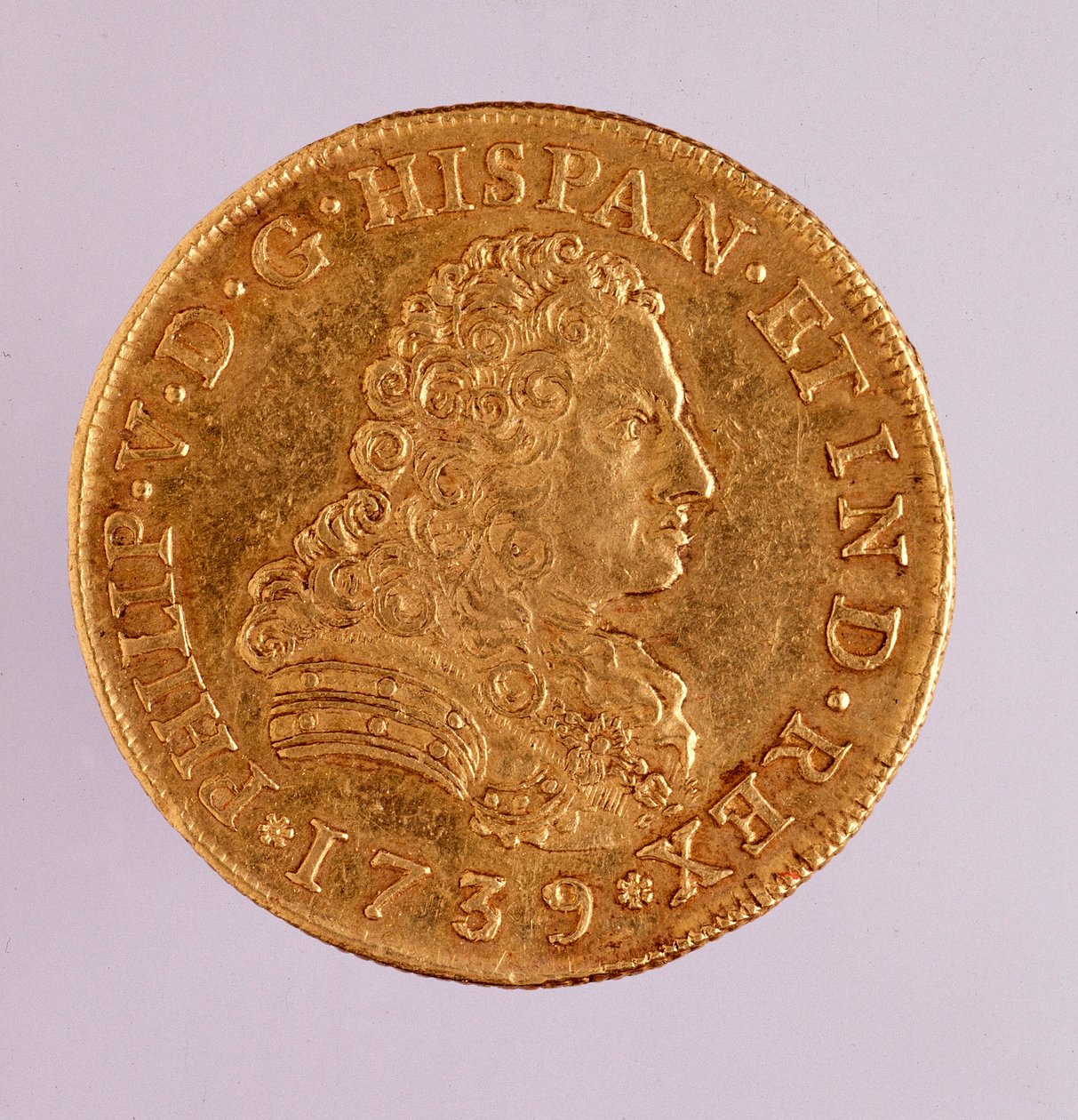 スペインの金貨（8ecu）：フィリップ（フィリッポまたはフィリップ）5世（1700-1746年）の時代。1739年 直径3.6cm ナポリ、ムゼオ・アルケオロジコ 作： スペイン語学校
