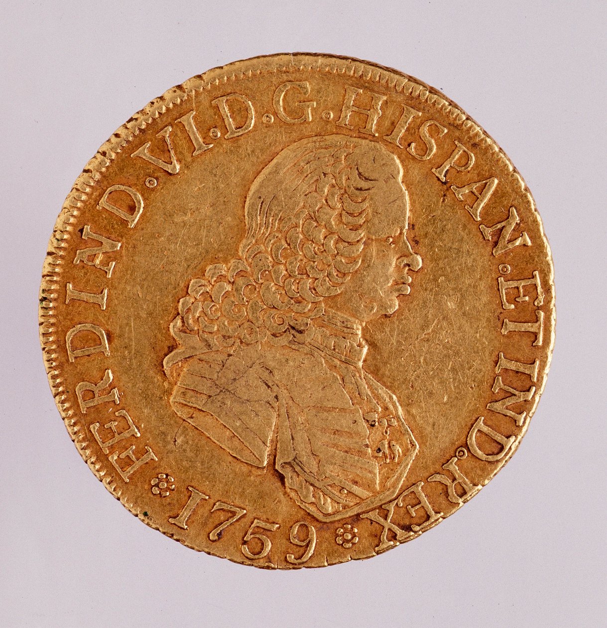 スペインの金貨（8エクウス）：フェルディナンド（フェルディナンド）6世（1746-1759）の時代。1759年 直径3.5cm ナポリ、ムゼオ・アルケオロジコ 作： スペイン語学校