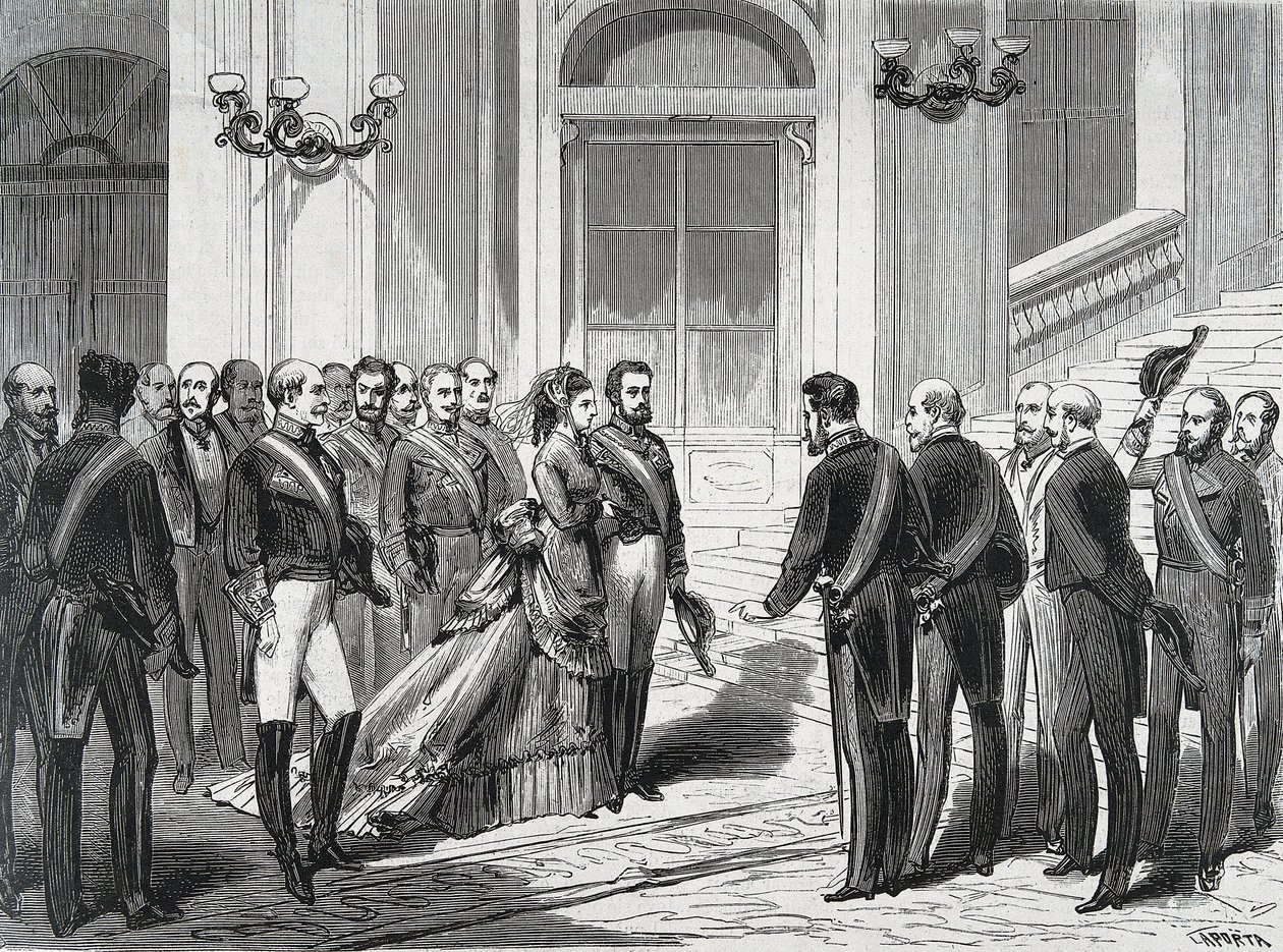 1871年3月19日、マドリッドの王宮に到着したスペイン国王アメデイー1世（Amedeo Ferdinando Maria di Savoia）（1845-1890）と妻のメアリー・ヴィクトリー（Victory dal Pozzo della Cisterna）（1847-1876）の肖像画。La Ilustracion Espanola y America」からのエングレーヴィング。 作： スペイン語学校