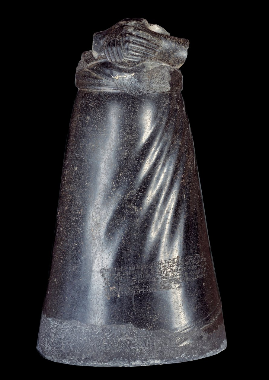 メソポタミア：アガデの王、マニシュトゥス（Manishtousu）（紀元前2270～2254年）の閃緑石像の下半分。紀元前2300年から2250年。スーサ（バビロン）の遺跡から。日 0,88 m パリ、ルーヴル美術館 作： シュメールメソポタミア学校