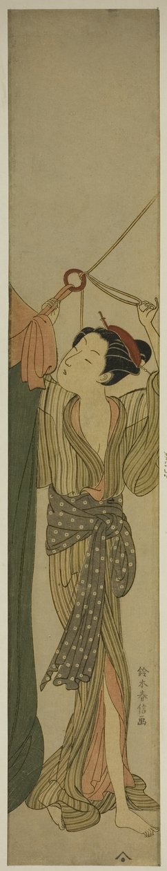 蚊帳を掛ける 作： 鈴木春信