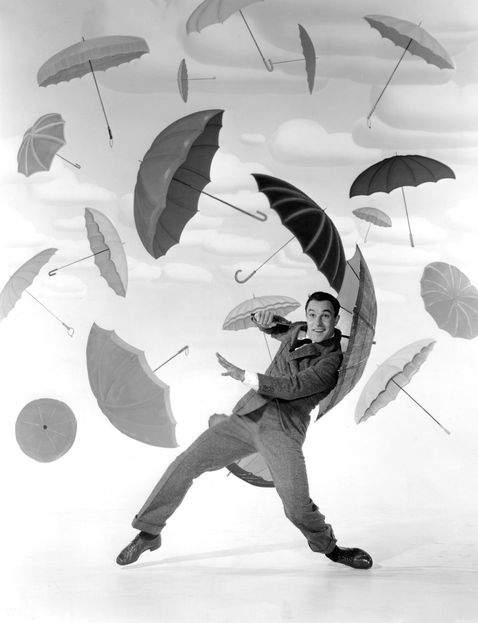 雨に唄えば」監督：ジーン・ケリー、スタンリー・ドーン 作： 不明