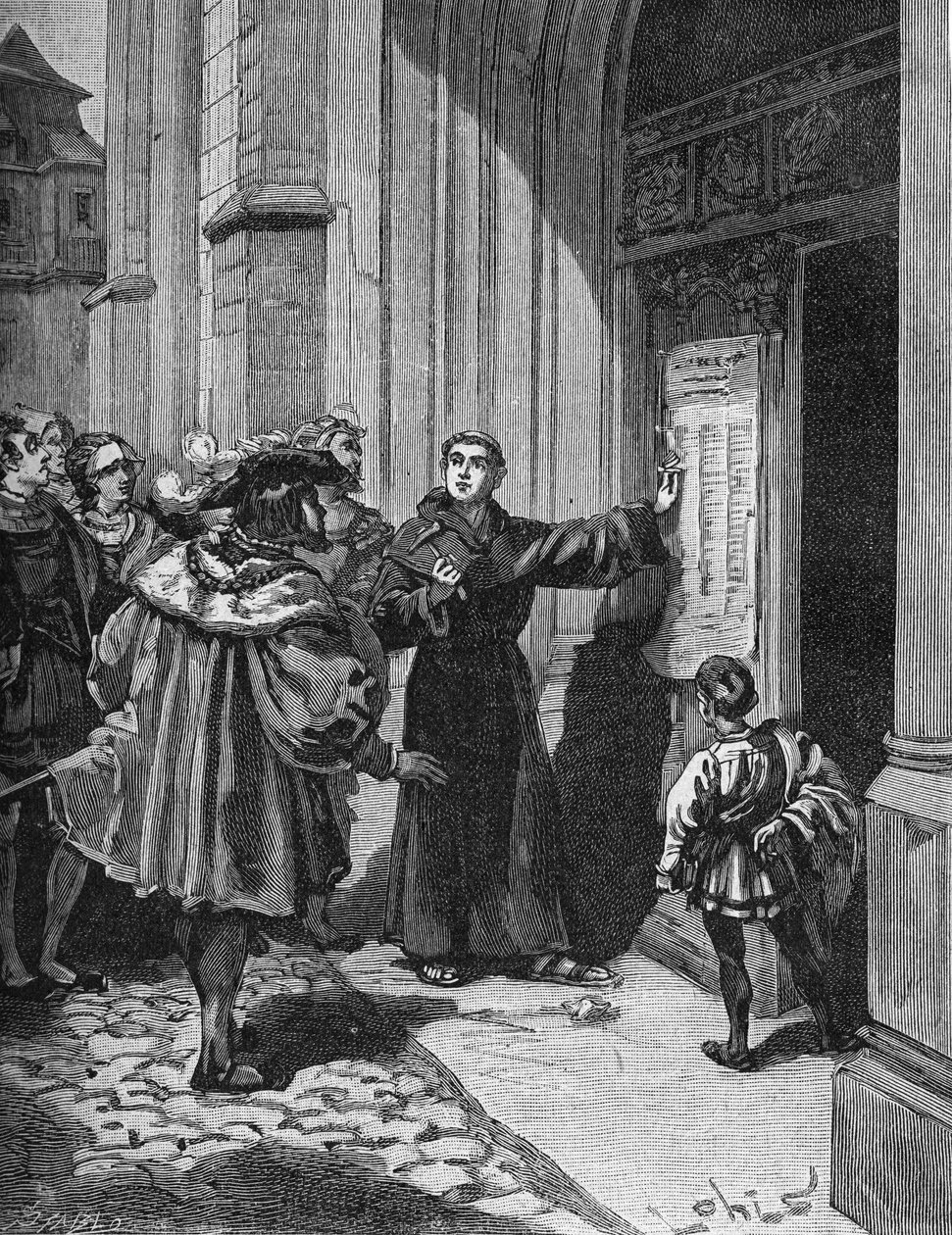 ヴィッテンベルクで95ヶ条の論題を掲げたマルティン・ルター（1483-1546）。 作： 無名の画家