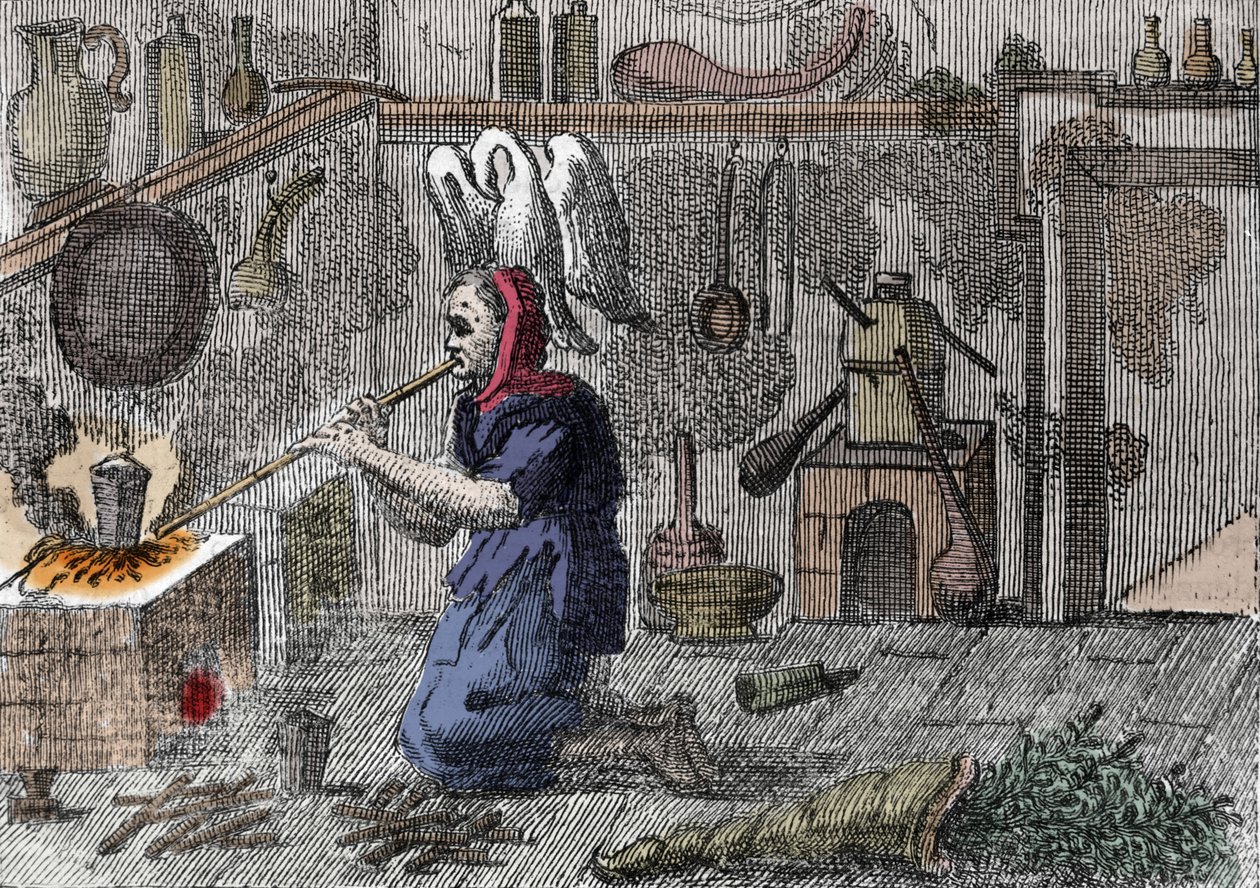 魔法の薬を準備する実験室の魔女、右は魔法のハーブが入った角笛。16世紀のエングレーヴィング 作： 無名の画家