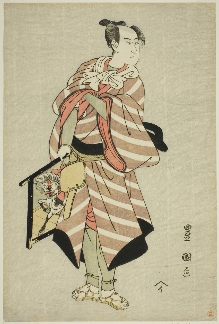 1797 年 11 月に桐劇場で上演された芝居「宮入り結びの紙垣」で、三代目沢村宗十郎が荷馬人むちぞうを演じた。 作： 歌川豊国I