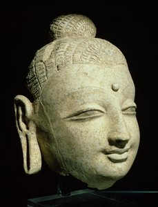 1〜4世紀のアフガニスタン出身の笑顔の仏、グレコ仏教様式の頭（漆喰）