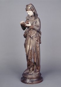 読者」（象牙とブロンズの彫刻