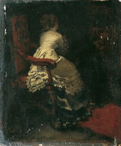肘掛け椅子の女性