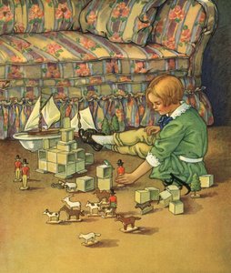 おもちゃの兵隊とブロックで遊ぶ少年