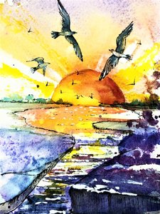 鮮やかな海に沈む夕日