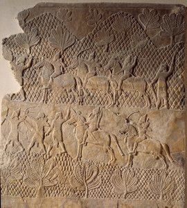古代の東洋美術：戦闘シーン。アッシリア、アッスルバニパル宮殿の低浮き彫り（前7世紀）。パリ、ルーヴル美術館（Musee Du Louvre 作： Assyrian