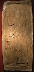 ポメルグラネートの木の枝を持つ司祭。アッシリア王サルゴン2世の宮殿からのレリーフの詳細、紀元前722〜705年