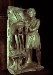 小麦を脱穀する。1200年頃の「月々の労働」の彫像カレンダーの7月（石材） 作： Benedetto Antelami