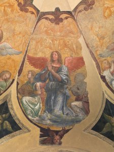 2人のひざまずくミュージシャンとケルビムの間で天使を祈る 作： Bernardino Luini