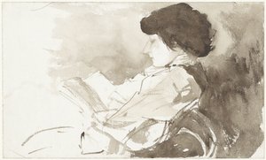 横顔で読書する女性