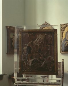 マドンナと子供（多色漆喰、木材、革、ガラス） 作： Donatello