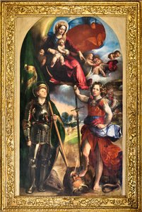 幼児イエスと聖ジョージと聖ミカエルの大天使とマドンナ、1518年頃（パネルに油彩）