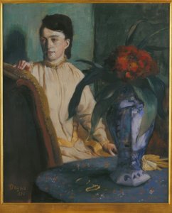 ポチシェを持つ女性 作： Edgar Degas