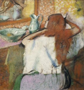 彼女のトイレでの女性 作： Edgar Degas