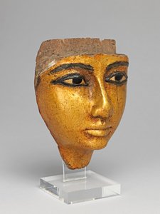 棺桶からの顔、目と眉毛がはめ込まれ、金色に塗られている 作： Egyptian 20th Dynasty
