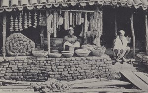 インド、カルカッタのネイティブショップ（モノクロ写真 作： English Photographer
