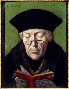 ヒューマニスト、トーマス・モア（1478-1535）の肖像。眼鏡をかけて本を読むヒューマニストが描かれています。フランドル派の絵画