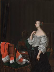 鏡の前に立つ女