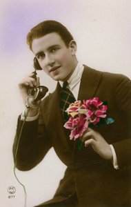 花を持って電話の男 作： French Photographer
