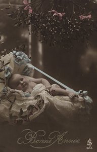 赤ちゃんと年賀状 作： French Photographer