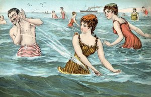 海で男をはねかける女の子