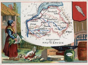 フランス、ローヌ・アルプ（Rhone-Alpes）地方のオート・サヴォワ（Hute-Savoie、74）。地方の特産品：紙、グリュイエール、蜂蜜、タバコ、溶鉱炉。フランスの各県に関するシリーズ。クロモリ（Chromo）「地理的な糸」、1920年頃。個人蔵 作： French School