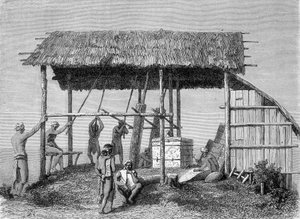 1862年に出版された「Le Tour du monde」に掲載されたボルネオ島のダヤック族の鍛冶屋を描いたイラスト。エングレーヴィングです。 作： French School